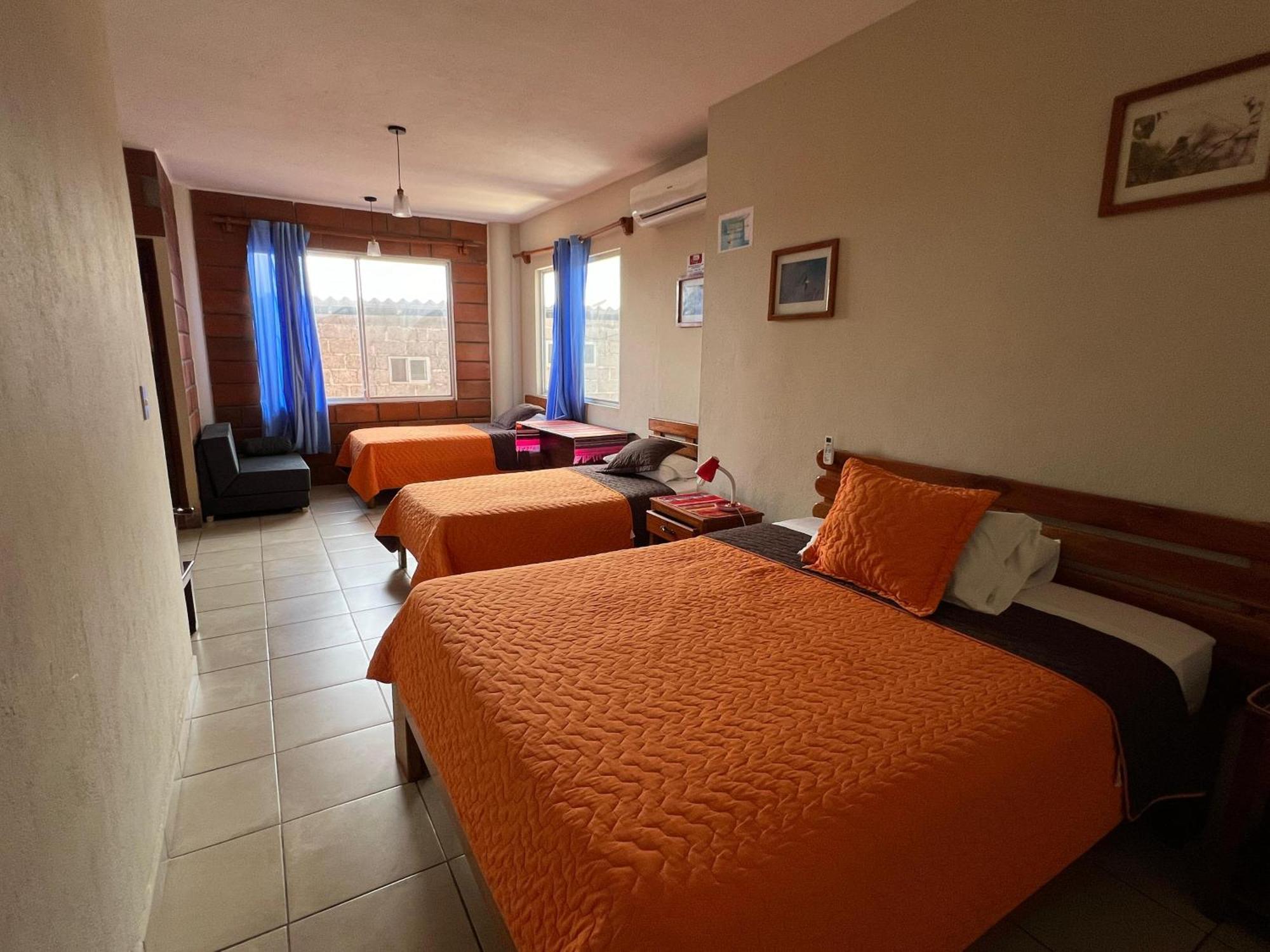 Hostal Cattleya Пуерто-Бакерісо-Морено Екстер'єр фото